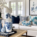 Beachside Bliss art bundle displayed in a modern coastal living room, featuring two 30x50cm prints of the Paloma Sailing Club collection. Ideal for beach house decor.