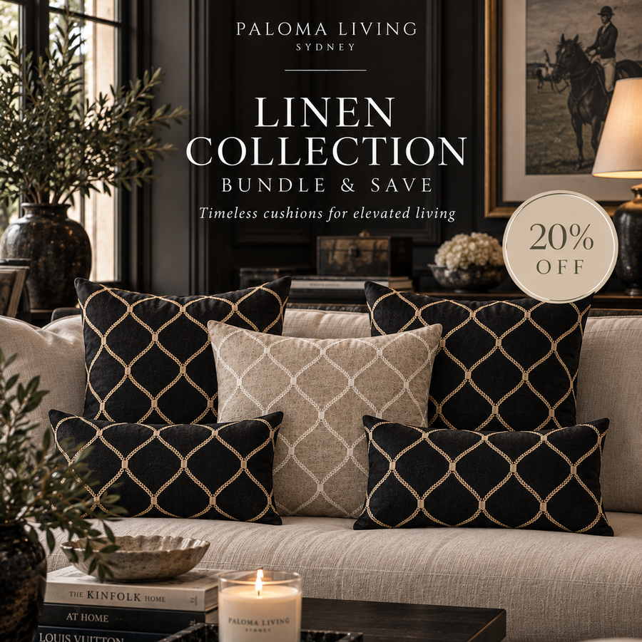 A styled interior scene showing a beige sofa with multiple decorative throw pillows in black and beige, overlaid with promotional text reading 'PALOMA LIVING SYDNEY', 'LINEN COLLECTION BUNDLE & SAVE', and '20% OFF'.
